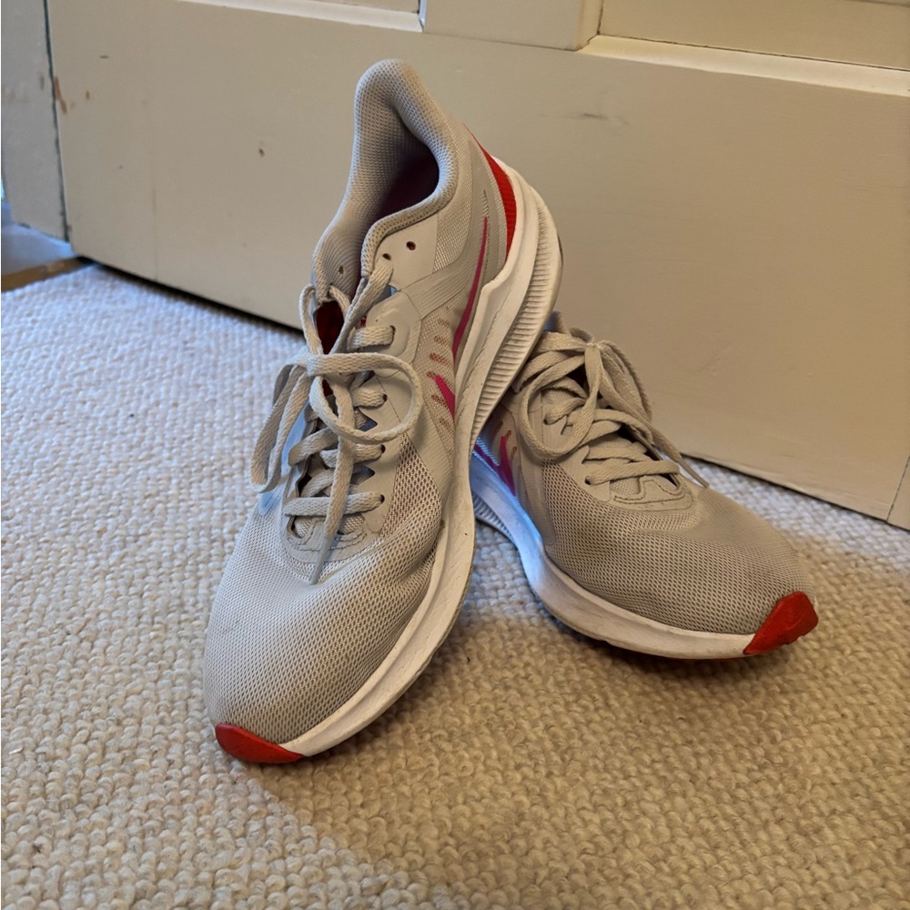 Gray Red and Pink Nike Downshifter